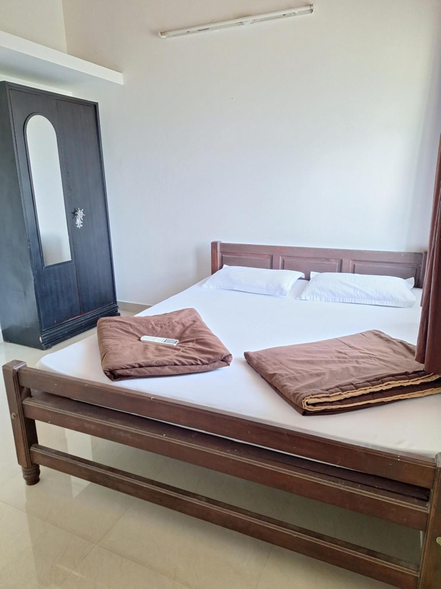 Suvarna Grande Homes منغالور الغرفة الصورة