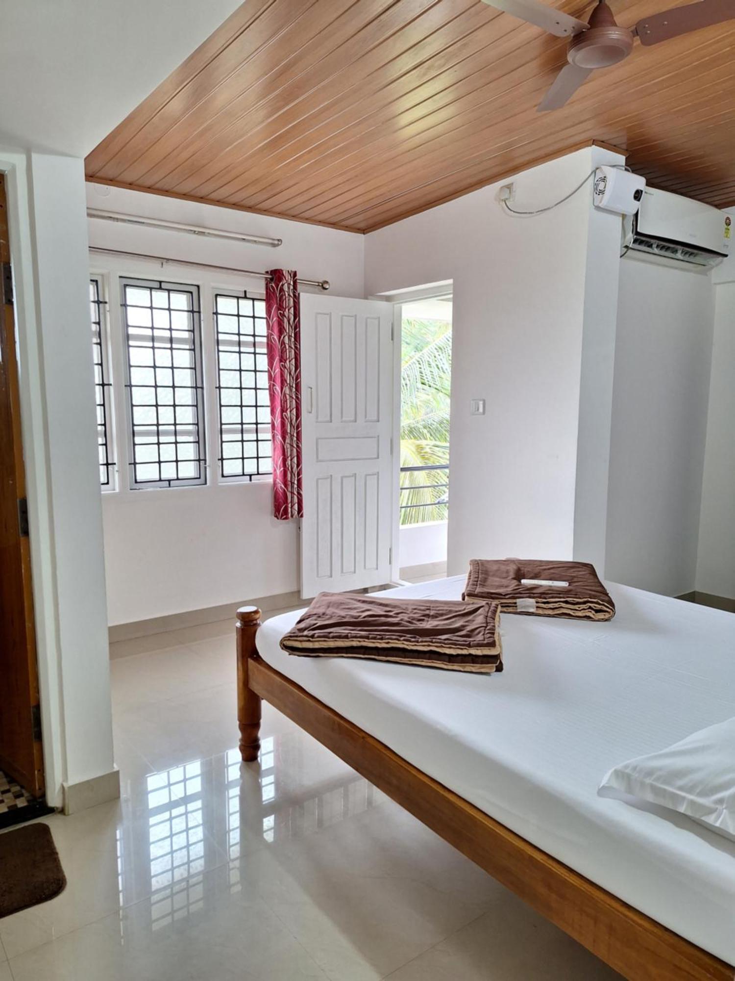 Suvarna Grande Homes منغالور الغرفة الصورة